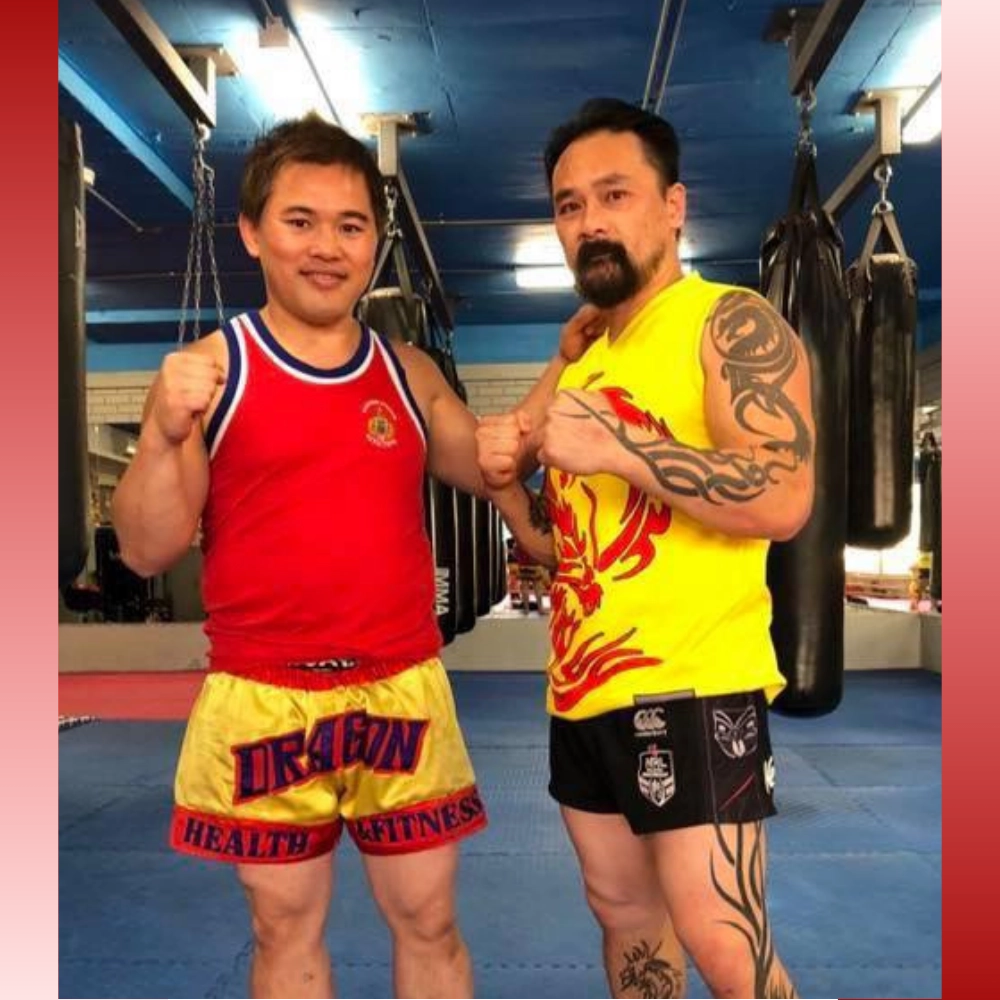 Paul Le with a Dragon Health and Fitness member